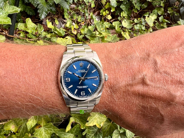 rolex oyster perpetual 166000 am Arm