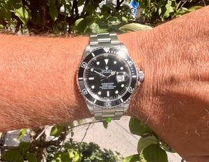 rolex Submariner 16610 am Arm