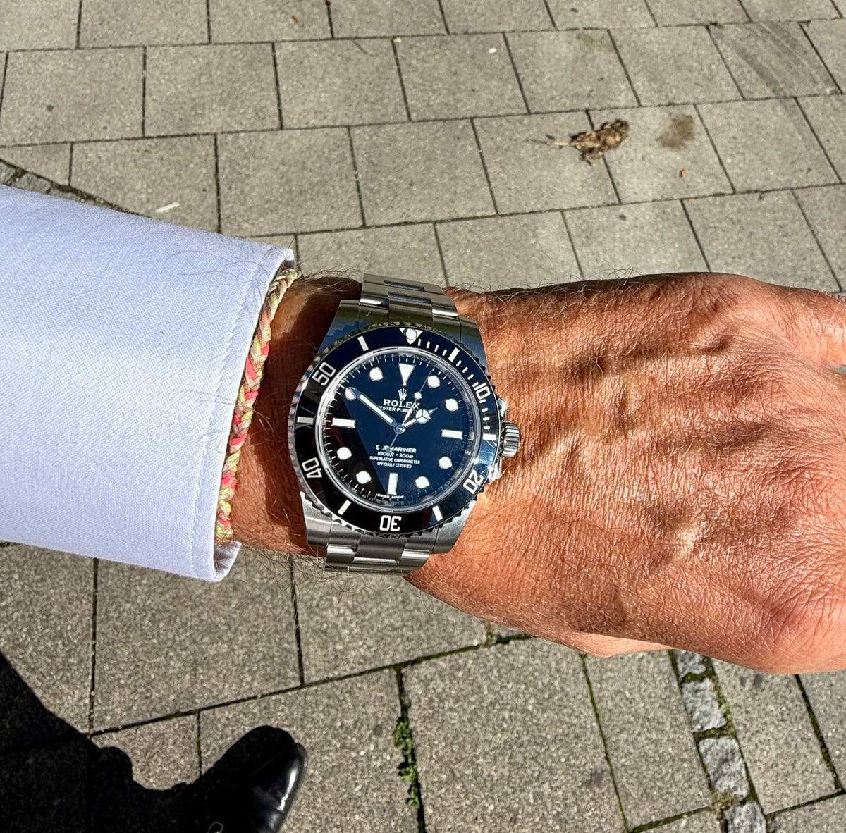 Rolex Submariner no Date 114060 am Arm 1