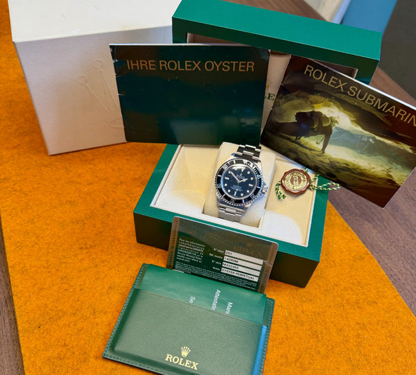 Rolex No Date Submariner 4-liner mit Papieren