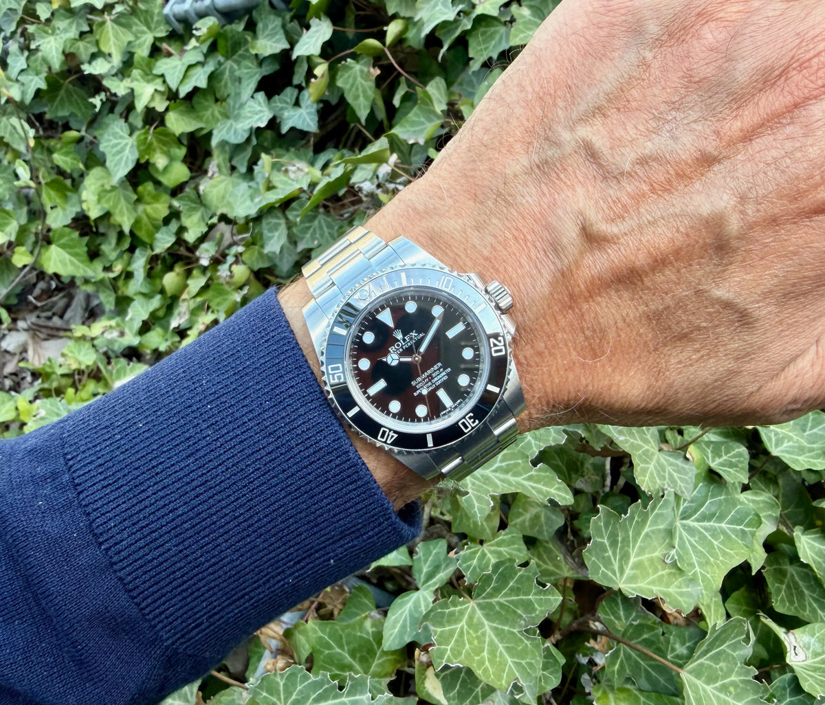 Rolex Submariner 114060 am Arm 
