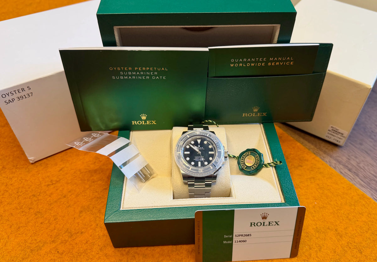 Rolex Submariner 114060 mit Papieren