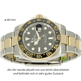 Rolex GMT 116173 Stahl Gold liegend 