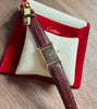 Cartier Tank must mech. braunrot mit Box 