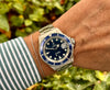 Tudor Submariner 79090 blue am Arm 