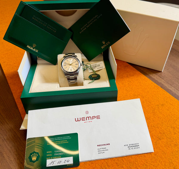 Rolex Oyster Perpetual 41 silber 124300 mit Papieren 