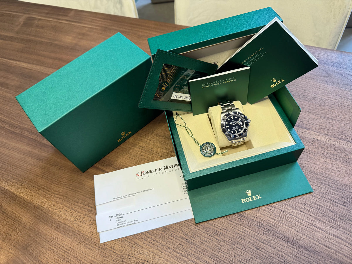 Rolex Submariner Date neu mit Papieren 